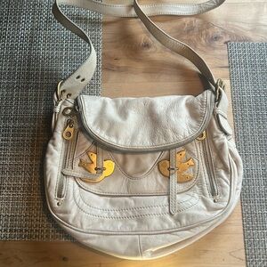 Cream Marc Jacobs petal to the metal